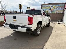 2016 Chevrolet Silverado 1500 4WD Crew Cab 143.5' High Country - Photo 9