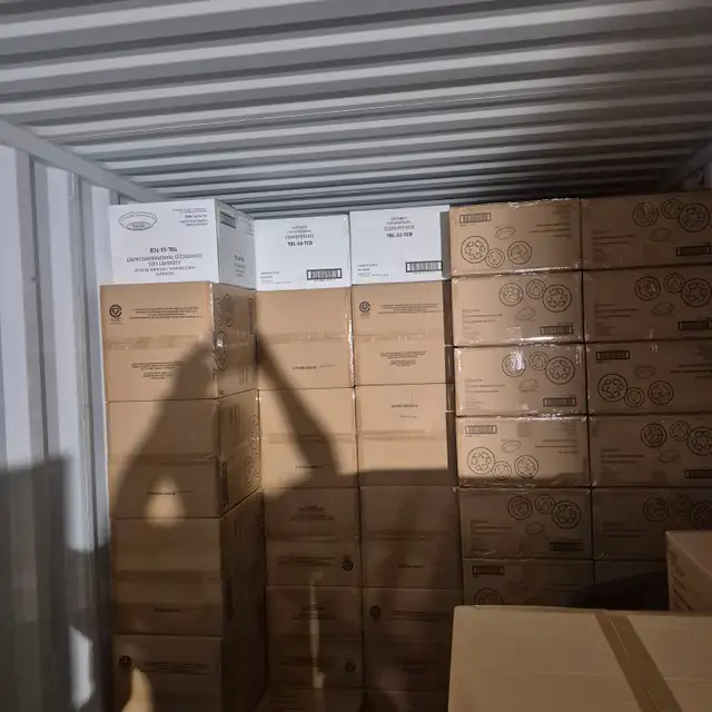 Unloading Containers - Photo 9
