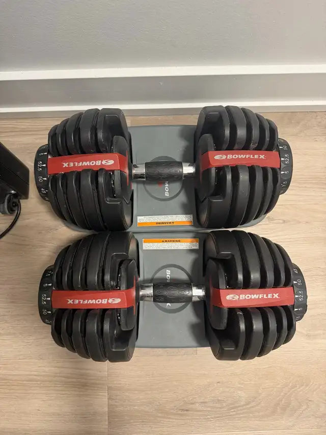 Selling Pair of Bowflex dumbbells, up to 52.5 lbs