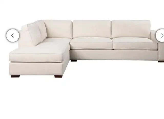 Cream fabric sectional with storage ottoman - Photo 5