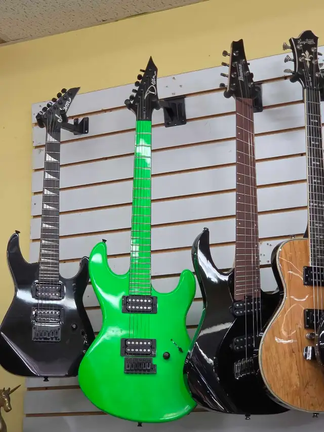 We buy Guitars (acoustic and electric)