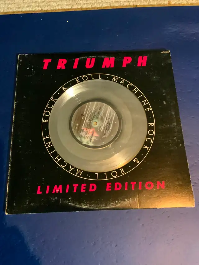 Triumph Rock & Roll Machine SILVER VINYL limited edition 1977