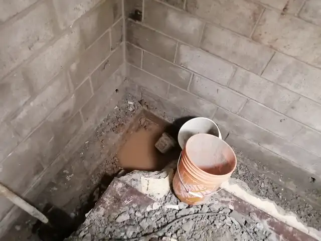 WET BASEMENT FLOOR WATERPROOFING SUMP PUMP ISSUE FOUNDATION LEAK - Photo 7