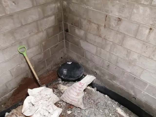 WET BASEMENT FLOOR WATERPROOFING SUMP PUMP ISSUE FOUNDATION LEAK - Photo 8