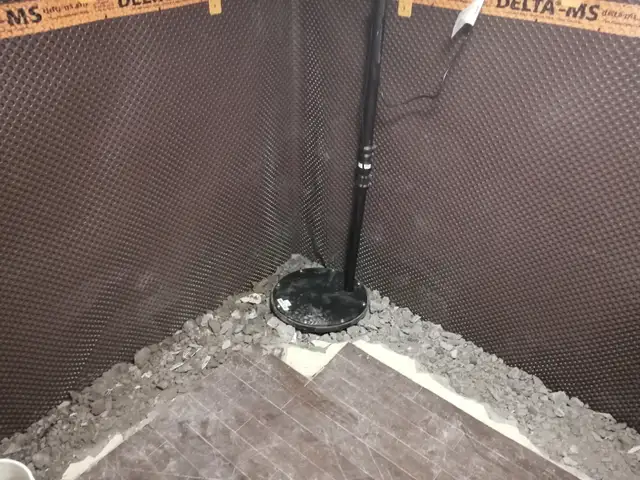 WET BASEMENT FLOOR WATERPROOFING SUMP PUMP ISSUE FOUNDATION LEAK - Photo 9