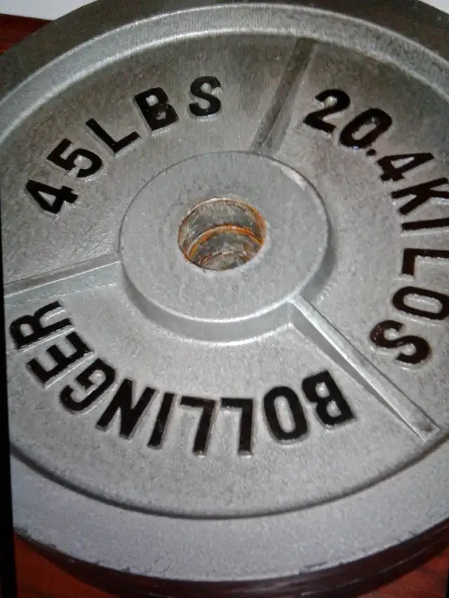 2x 45 olympic iron weight plates (Bollinger brand) $100 total - Photo 2