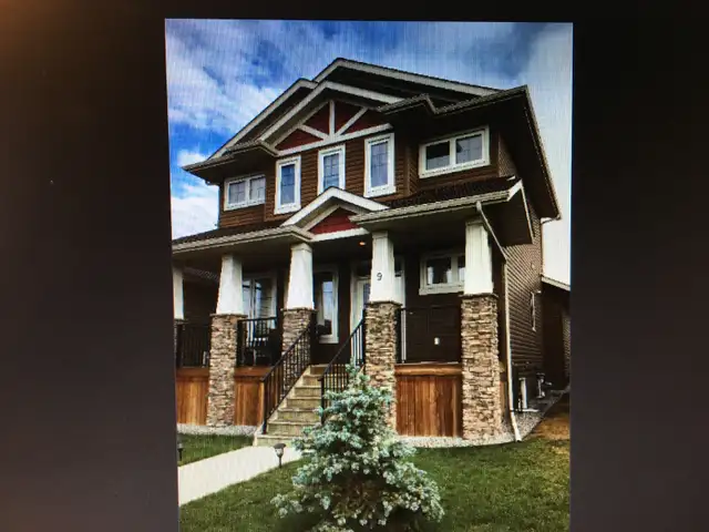 1307 sq ft two storey, attached heated garage, rent 1 yr lease