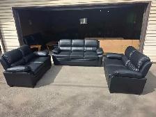 New black leather set. Free delivery & sofa disposal