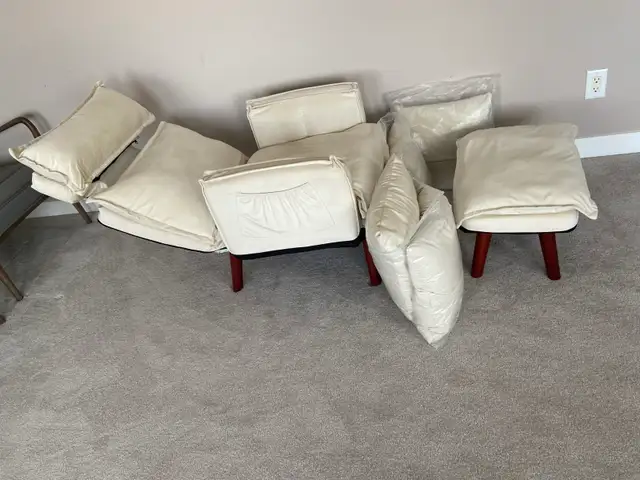 Cream fabric reclining arm chair $250.  Ottoman, 4 pillow - Photo 2