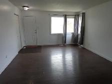 Open, bright 3-bedroom main-floor suite includes utilities