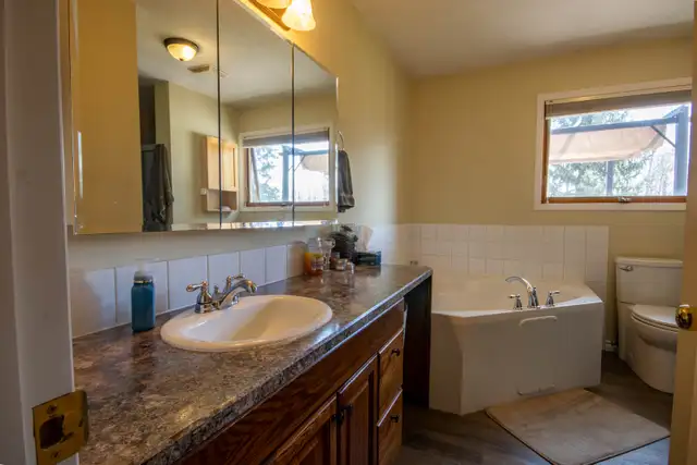 Bungalow for sale with Green space along the Red Deer River - Photo 9