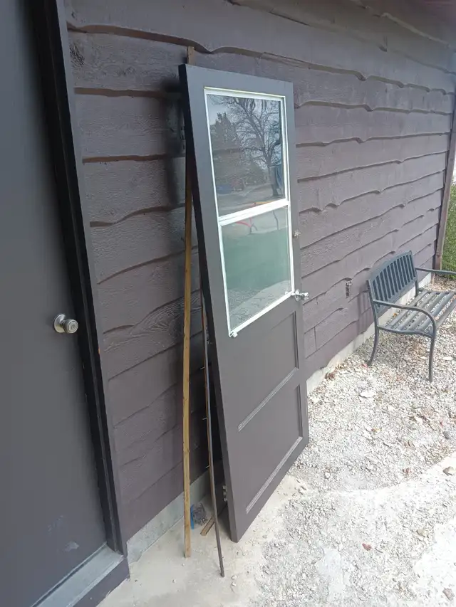 Storm door and aluminum screen door