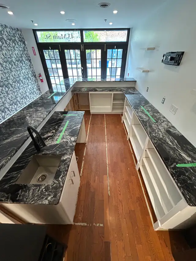Beautiful Granite Countertops, Cabinets and Bar sink