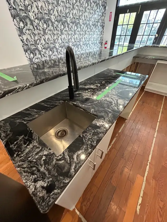 Beautiful Granite Countertops, Cabinets and Bar sink - Photo 8