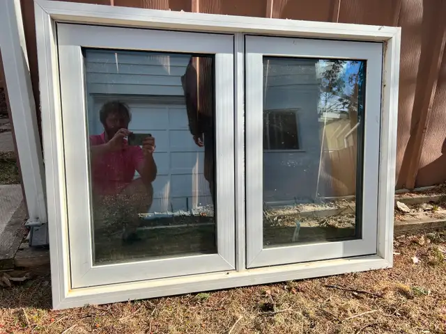 Triple pane two panel window