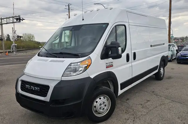 This Cargo Van powered by a Gasoline engine featuring FWD/Front- - Photo 2