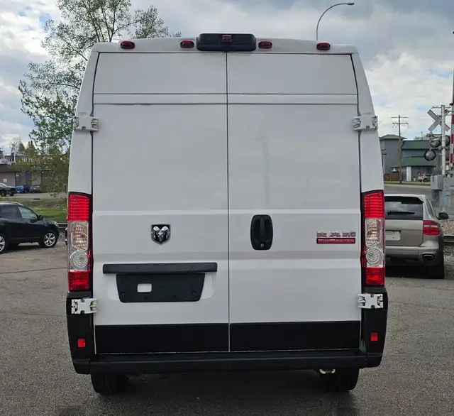 This Cargo Van powered by a Gasoline engine featuring FWD/Front- - Photo 6
