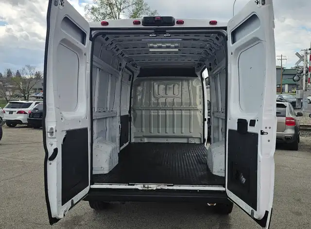 This Cargo Van powered by a Gasoline engine featuring FWD/Front- - Photo 7