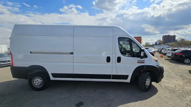This Cargo Van powered by a Gasoline engine featuring FWD/Front- - Photo 8