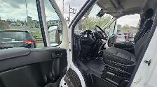This Cargo Van powered by a Gasoline engine featuring FWD/Front- - Photo 12