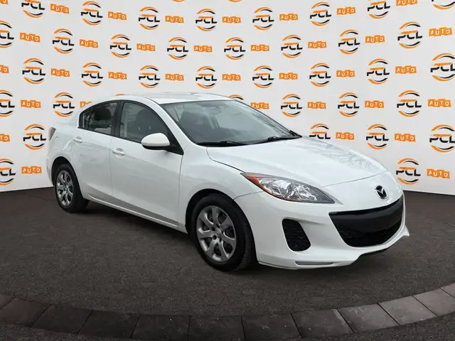 2013 Mazda Mazda3 Low Km  Power windows A/C  1yr warranty