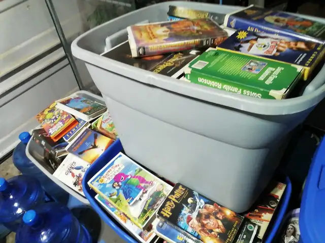 4 tots full of VHS tapes