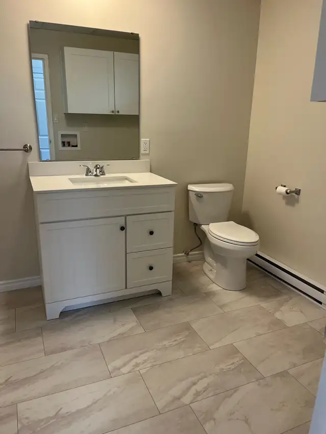 Spacious and newly renovated 2 Bedroom walk up in Val Caron. - Photo 2