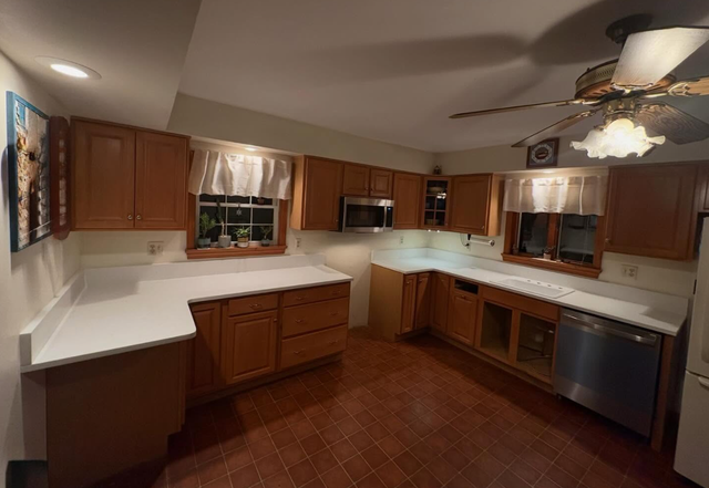 Plain White Countertops With Orange Island 437-522-8447