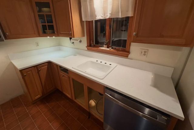 Plain White Countertops With Orange Island 437-522-8447 - Photo 3