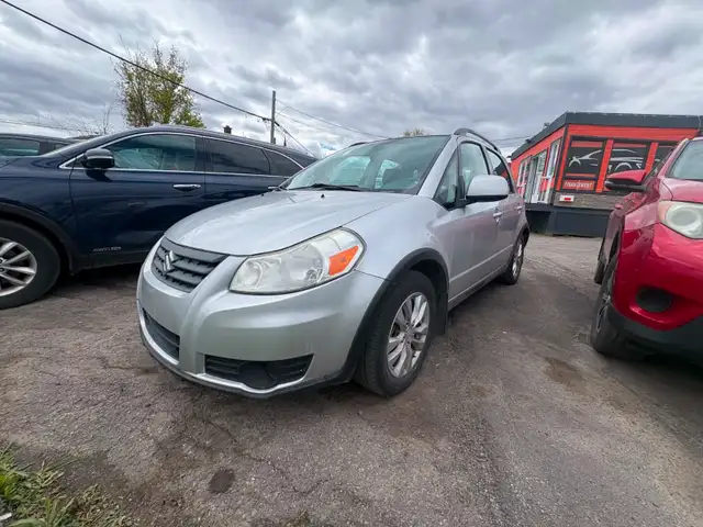 Suzuki SX4 2013 Man. 78 500km AWD $3995. Rusty 450-820-0550