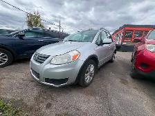 Suzuki SX4 2013 Man. 78 500km AWD $3995. Rusty 450-820-0550