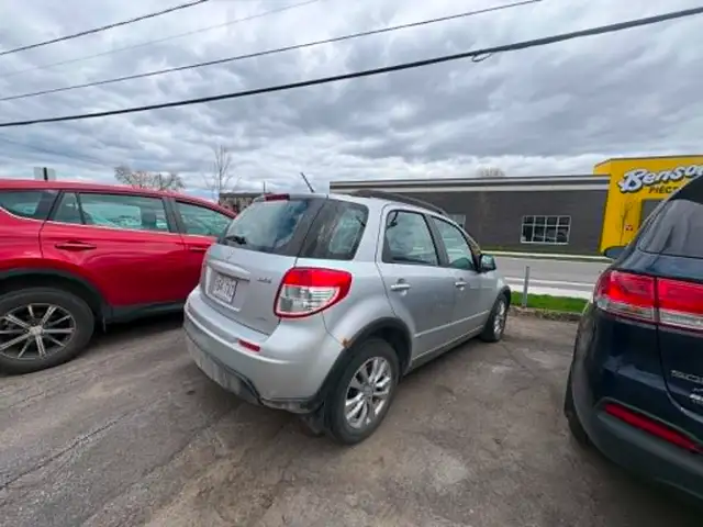 Suzuki SX4 2013 Man. 78 500km AWD $3995. Rusty 450-820-0550 - Photo 2