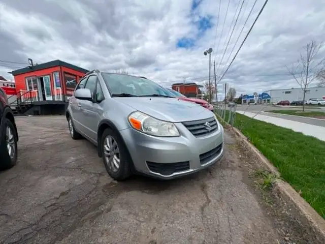 Suzuki SX4 2013 Man. 78 500km AWD $3995. Rusty 450-820-0550 - Photo 3