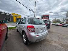 Suzuki SX4 2013 Man. 78 500km AWD $3995. Rusty 450-820-0550 - Photo 4