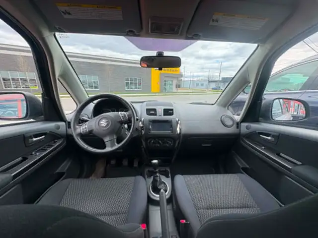Suzuki SX4 2013 Man. 78 500km AWD $3995. Rusty 450-820-0550 - Photo 5