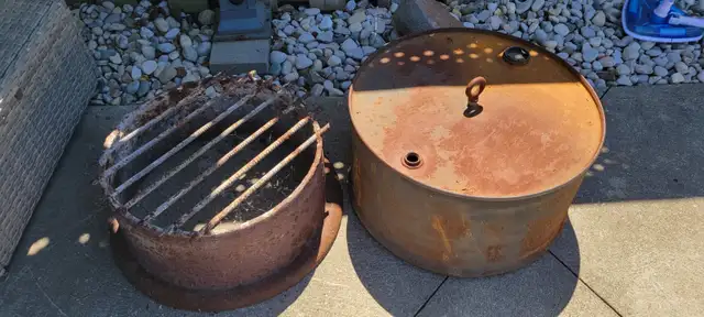 Metal Fire Pit for sale...$40 or hest offer.