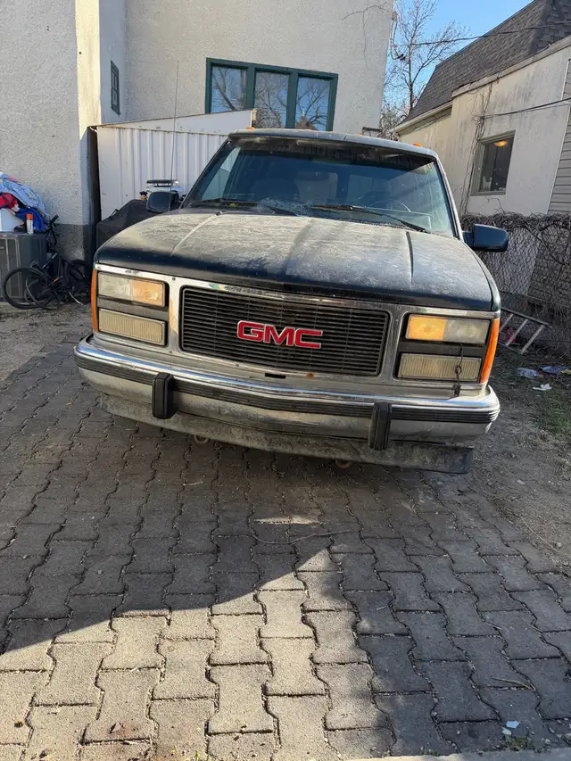 92 GMC Suburban 2 Wheel Dr. - Photo 4