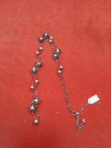 chaîne en stainless avec motif fleur