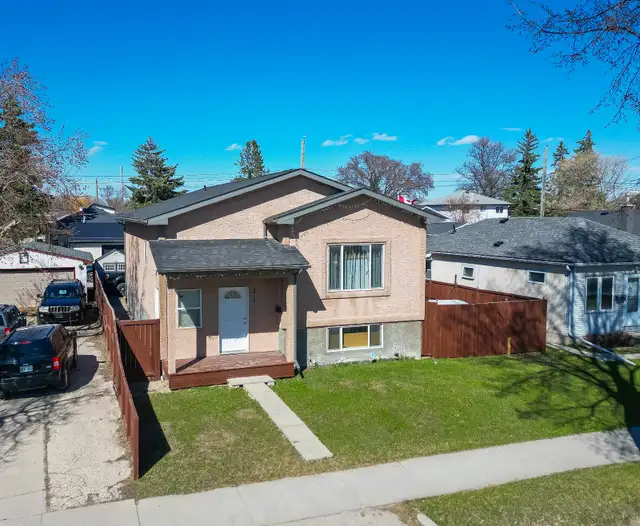 OPEN HOUSE! Rare 6bdrm Gem in West K w/ high income potential!
