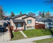 OPEN HOUSE! Rare 6bdrm Gem in West K w/ high income potential!