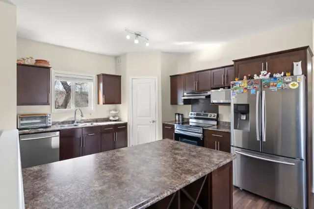 OPEN HOUSE! Rare 6bdrm Gem in West K w/ high income potential! - Photo 5