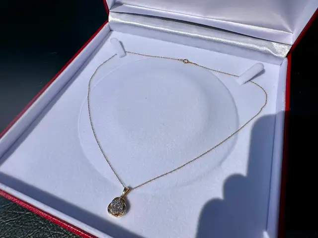#807 - 1/2 Carat Diamond Cluster Pendant & 10k Chain. 18"