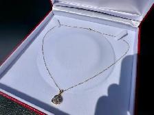 #807 - 1/2 Carat Diamond Cluster Pendant & 10k Chain. 18"