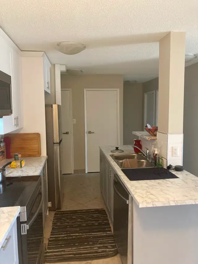 Stunning Renovated 2-Bedroom with Balcony—All Utilities Included - Photo 6
