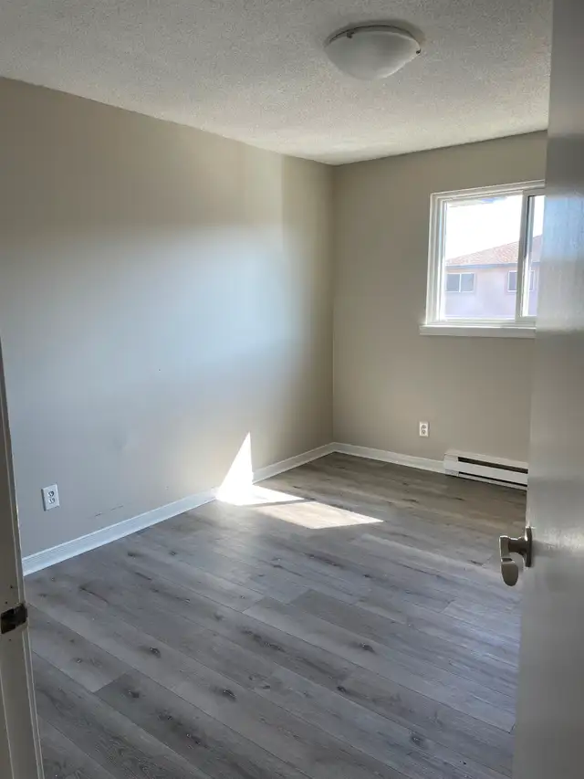 Stunning Renovated 2-Bedroom with Balcony—All Utilities Included - Photo 9