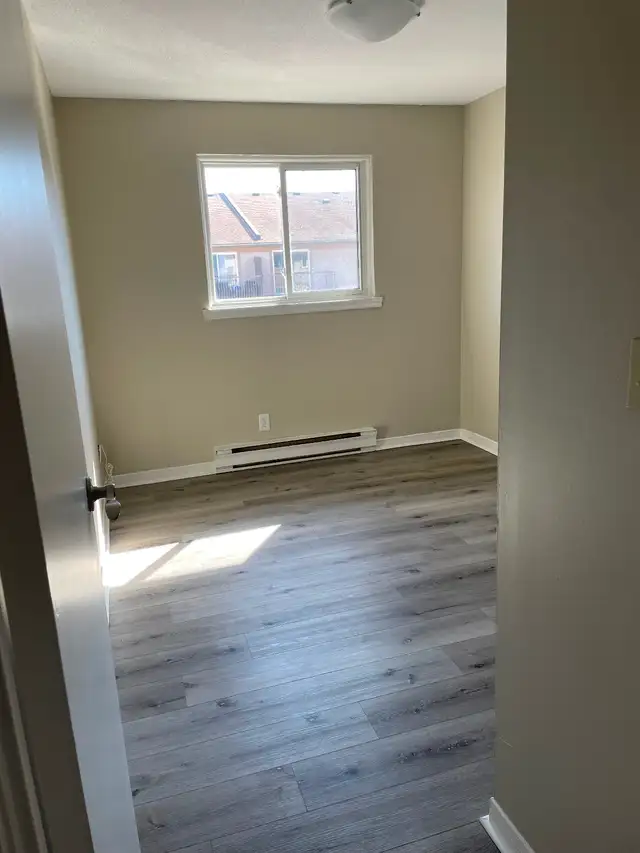 Stunning Renovated 2-Bedroom with Balcony—All Utilities Included - Photo 10