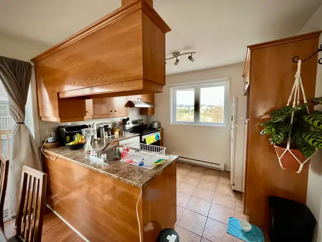 Grand 4 1/2 sur deux étages - Photo 3