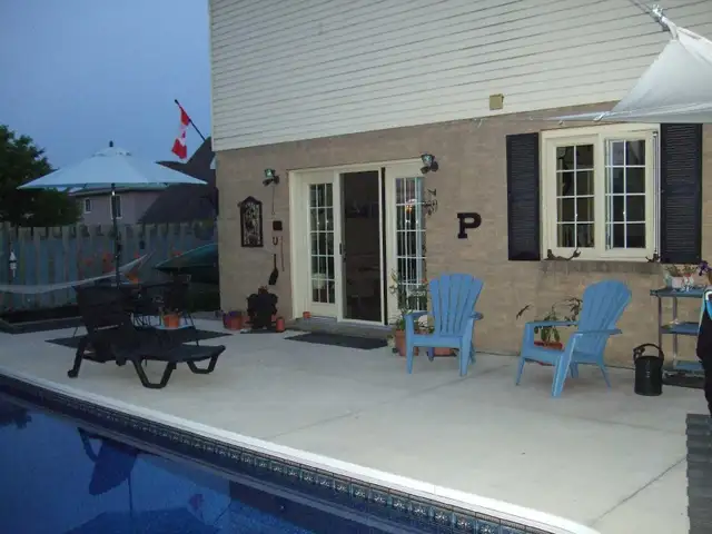 Family home with in-ground pool on quiet cul-de-sac. - Photo 3