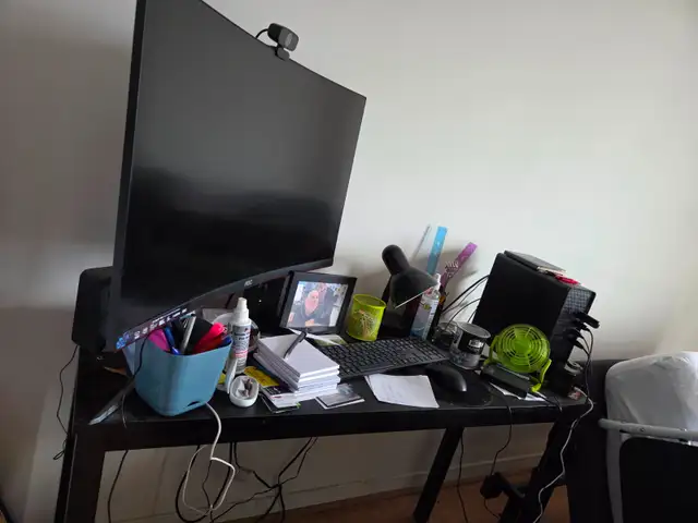 Desktop with 27 inch monitor and desk
