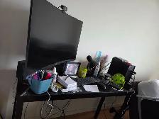 Desktop with 27 inch monitor and desk
